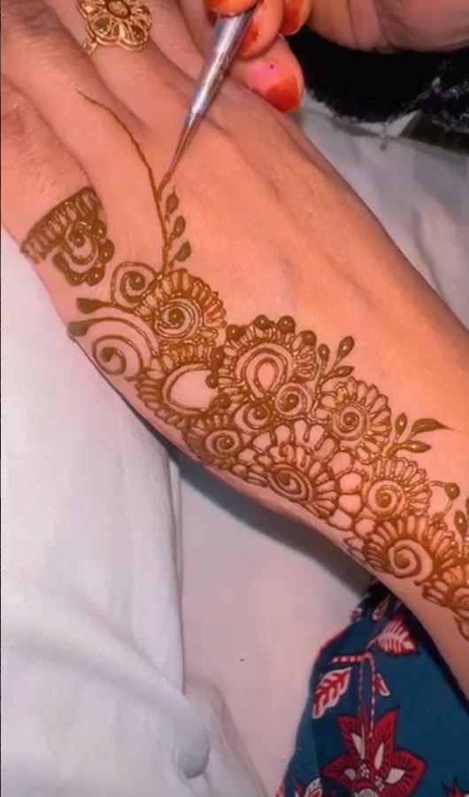 Traditional henna tent seating setup for events